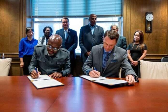 TU President Dr. Olu Q. Menjay and University of Memphis President Dr. Bill Hardgrave.